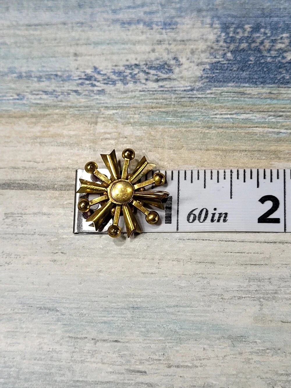 Gold Starburst Brooch and Earring Set with Red Rhinestones